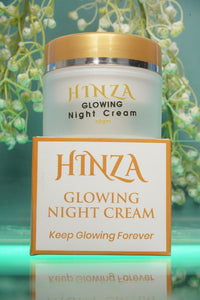 Hinza Glowing Night Cream with packaging on a green floral background