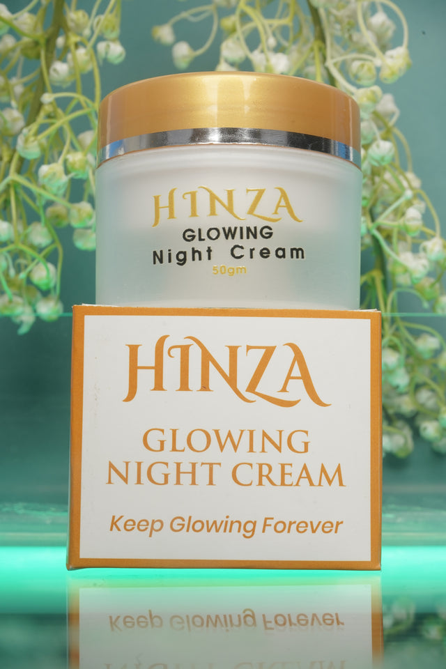 Hinza Glowing Night Cream with packaging on a green floral background